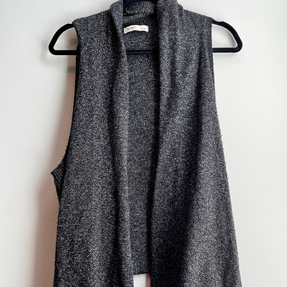 2 black sweater vests